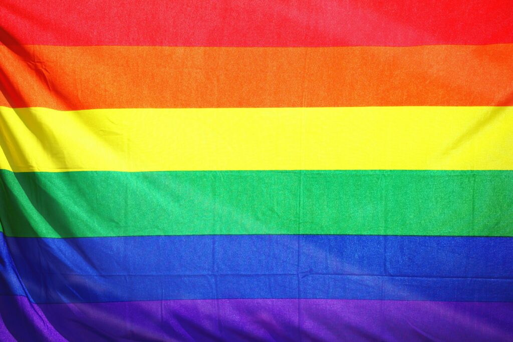 Close-up of a colorful rainbow flag symbolizing LGBT pride and diversity.